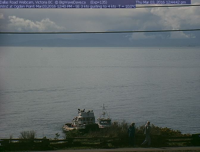 Barges on the beach
Tugs working to clear the abandoned barges off the beach.
