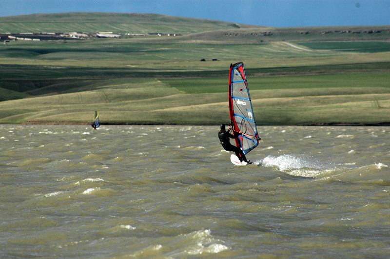 A snap I took as I arrived at 6:30 PM. Nattish chop, 3.7 sails. The wind decreased temporarily, then increased significantly! As the sun decended the light became great for photos..but I didn't take any - too busy sailing!
