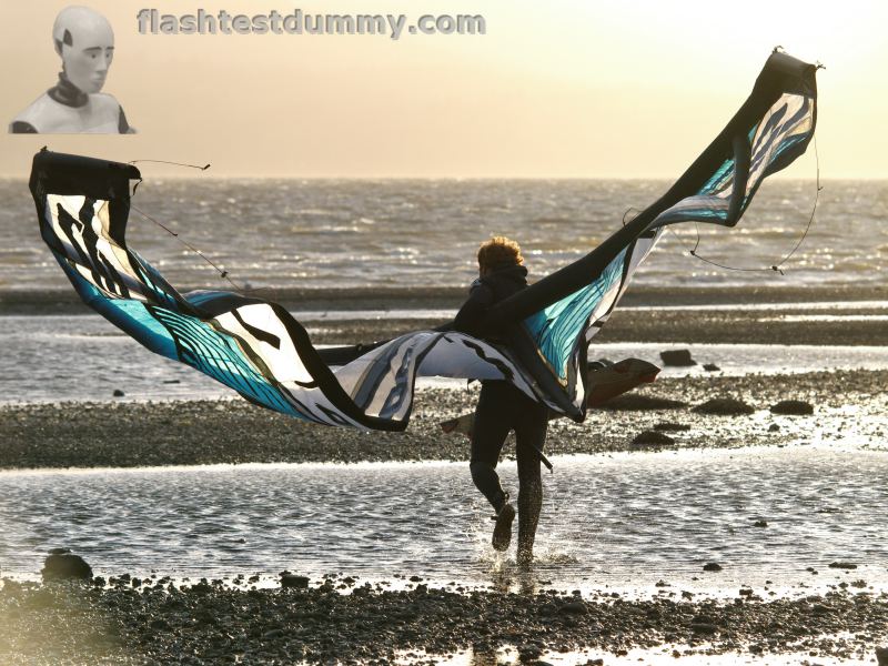 Hellish wind, sun going down, Wade going kiting.
How is kiting spelled?  And how do I keep my fingers warmer?
